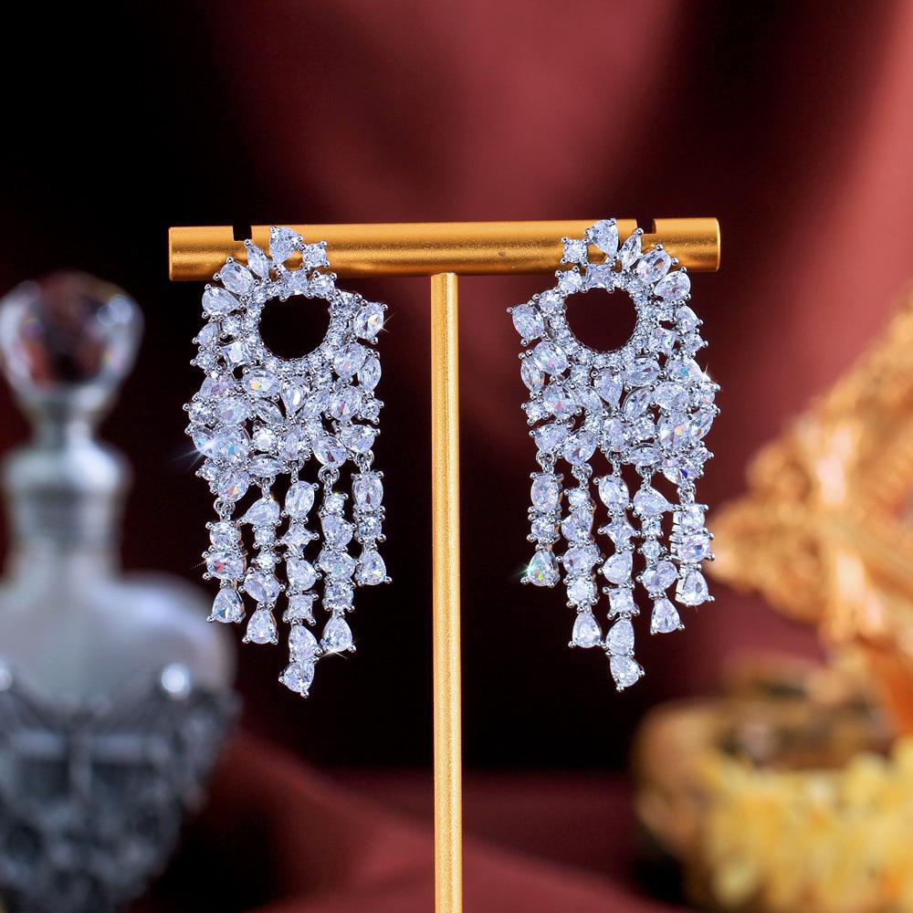 Серьги с цирконами и бахромой, демонстрирующие маленькое лицо, серьги высокого класса