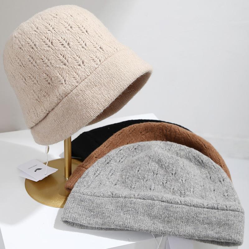 Autumn and winter new knitted warm fashion heavy leaf pattern hollow casual pile hat children's pullover confinement hat