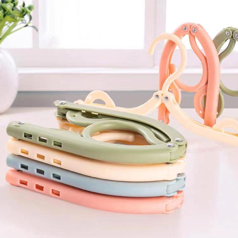 Случайная многофункциональная пластиковая вешалка для одежды, экономящая место в дороге, складная вешалка, креативная вешалка для одежды, детская вешалка