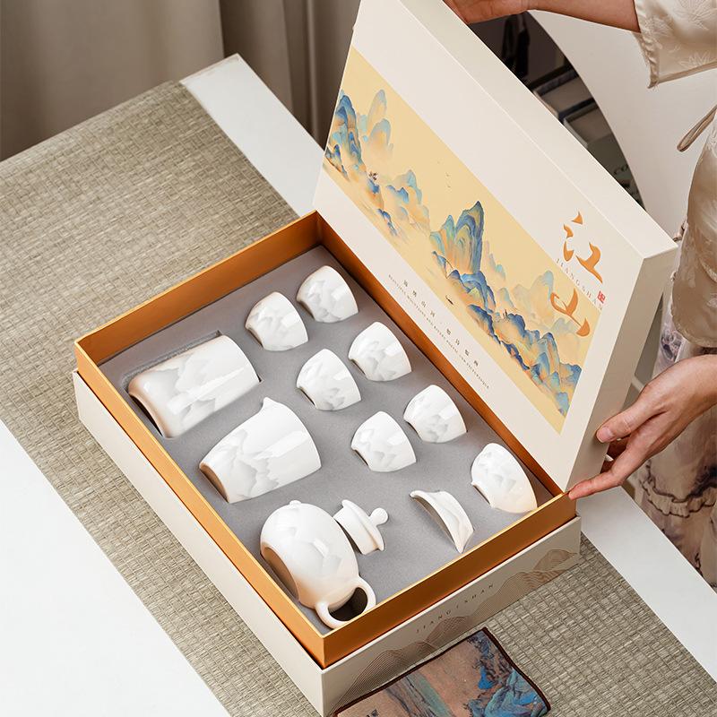 Tea set suet jade white porcelain kung fu tea set Dehua white porcelain ink wind light luxury gift box company gift