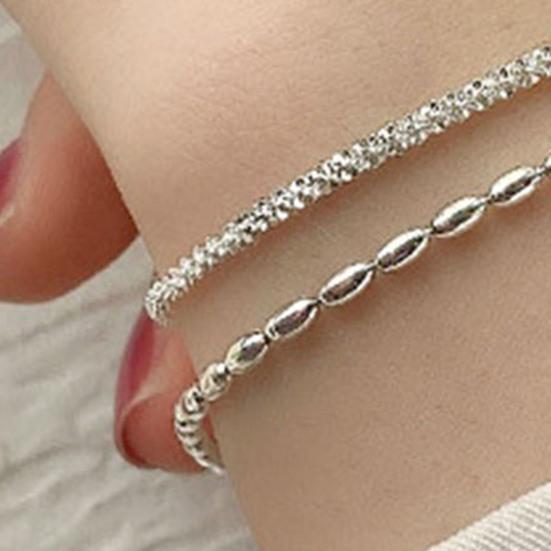 Женский браслет двухслойный регулируемой длины с удлиненной цепочкой из полой меди