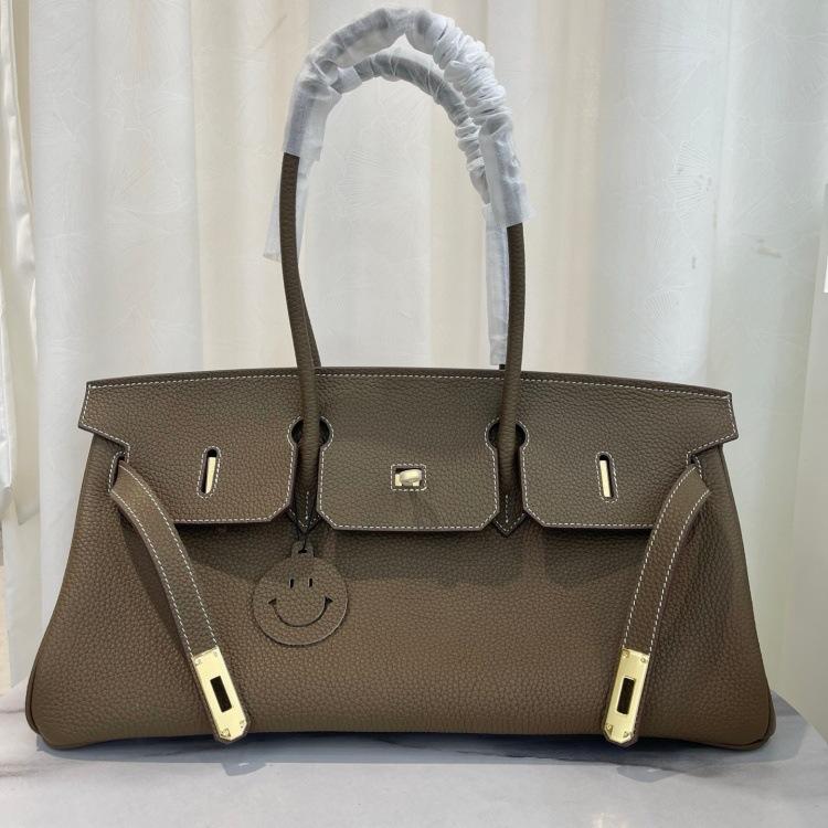 Cross-border trend bag short version oversized portable shoulder bag TOGO first layer cowhide large capacity giant pack