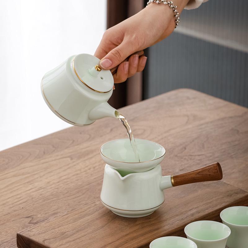 Jade Green Travel Tea Set: One Pot, Four Cups, with Wooden Side Handle and Tea Caddy.