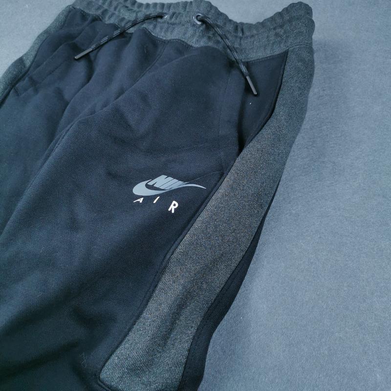 Nike Спортивные брюки Nike SwooshAir из вязаного материала, серия Sports Lifestyle, с флисом, утолщенные, с манжетами, дышащие, повседневные, для детей, черные AR7301-010