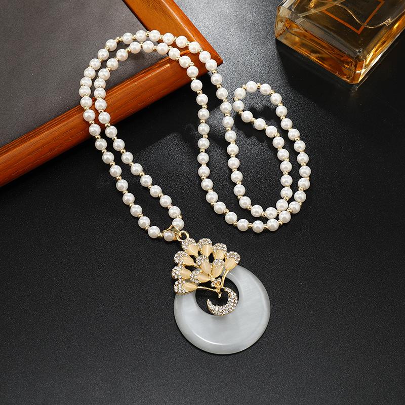 Длинное и изысканное колье, хрустальный кулон, цепочка для свитера, высококачественное и универсальное колье, простые и высококачественные аксессуары для цепочки для свитера.