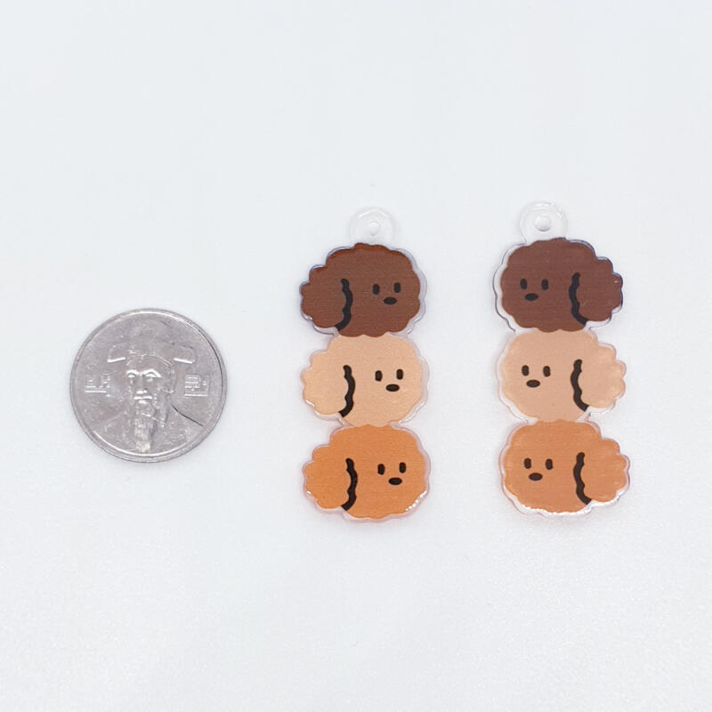 Materials for making a poodle puppy pendant and danggo skewer keychain