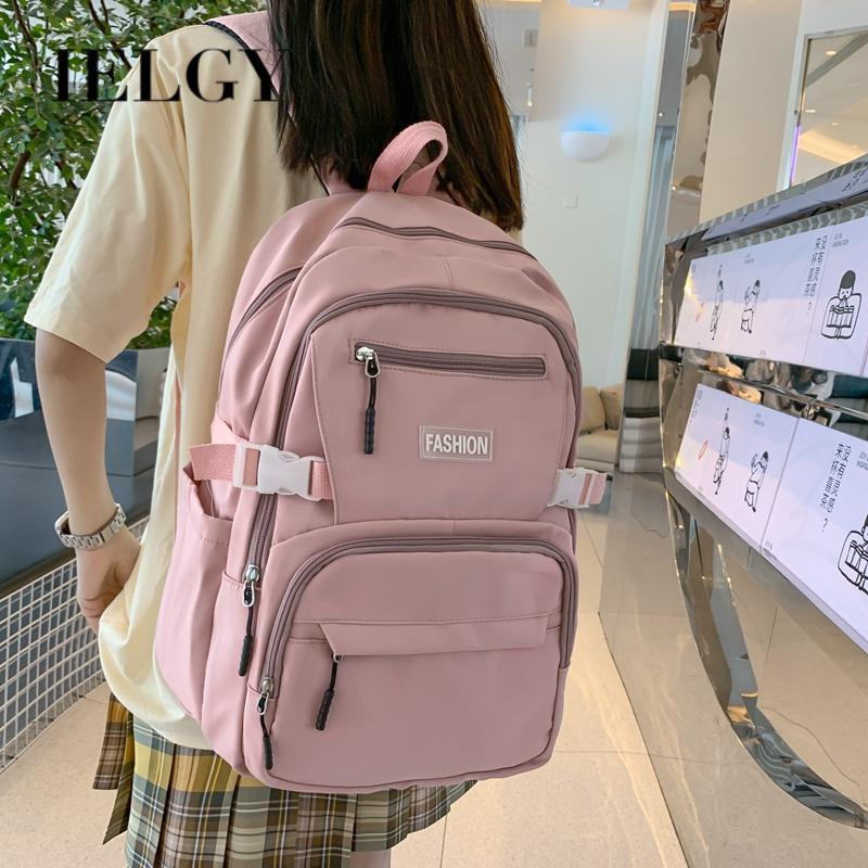 IELGY Korean Version of the Casual Large-capacity Backpack Female Simple Primary School Junior High School Student Bag