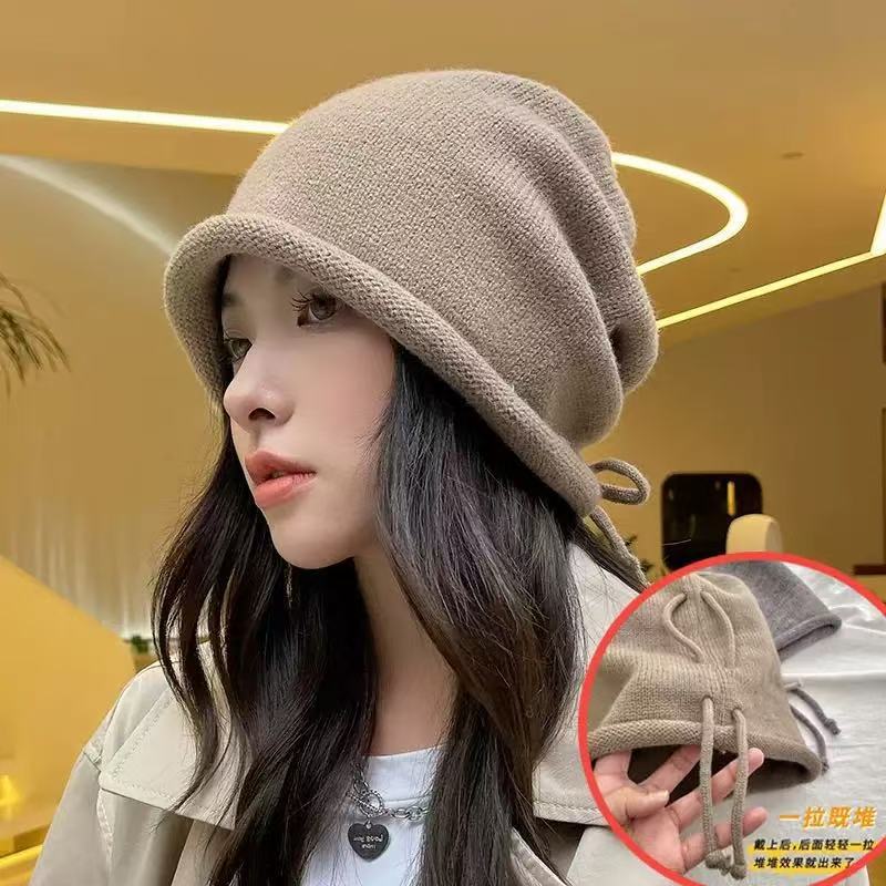 Drawstring stacking hat children autumn and winter show a small face cold hat annual explosion warm knitted hat bag head wool hat men