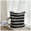 Woven bag women's new summer seaside hollow tote bag large-capacity commuter messenger bag