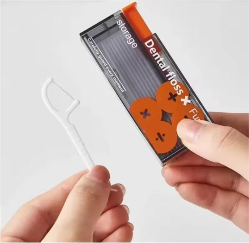 Portable dental floss automatic pop-up storage, capable of carrying disposable dental floss sticks, containing 10 dental floss