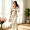 Women's satin lapel long-sleeve shirt with pink cherry blossom print on off-white base, soft fresh style, for dating, office and travel