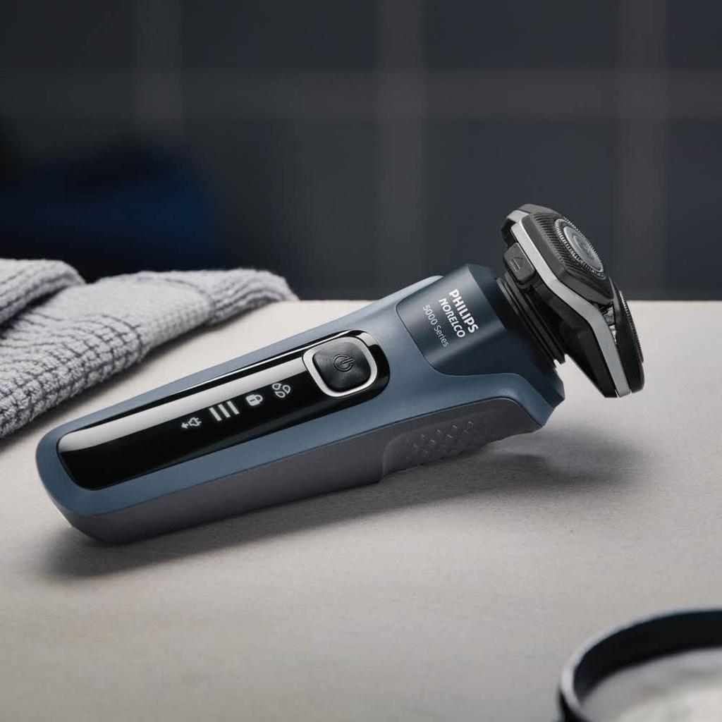 Электробритва SkinIQ серии 5000 S5880/33 Цвет: Океанский синий