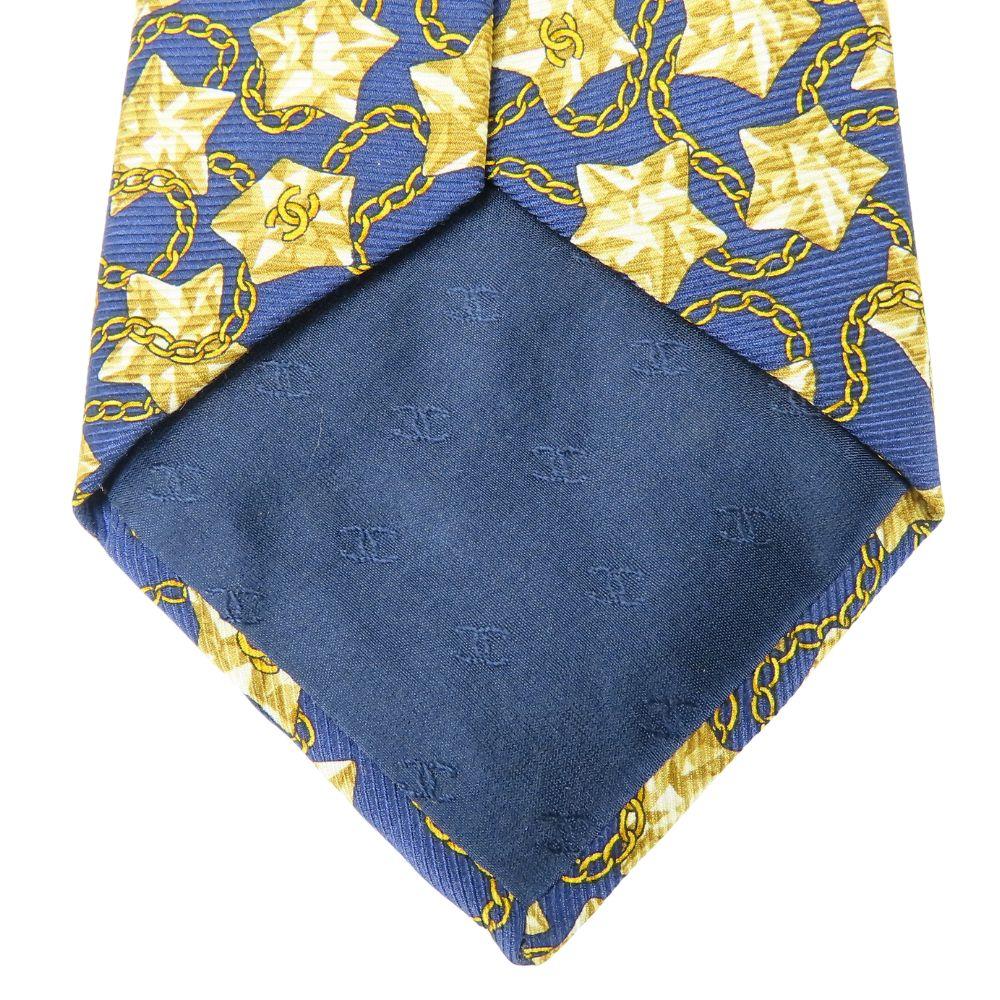 Used CHANEL tie COCO Mark Star Chain silk Navy gold suit