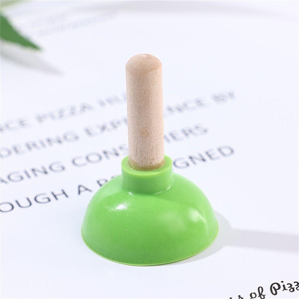 Крупный план Держатель для телефона в форме унитаза Мини-унитаз Присоска Подставка Красочный Крошечный Плунжер Магия Новички