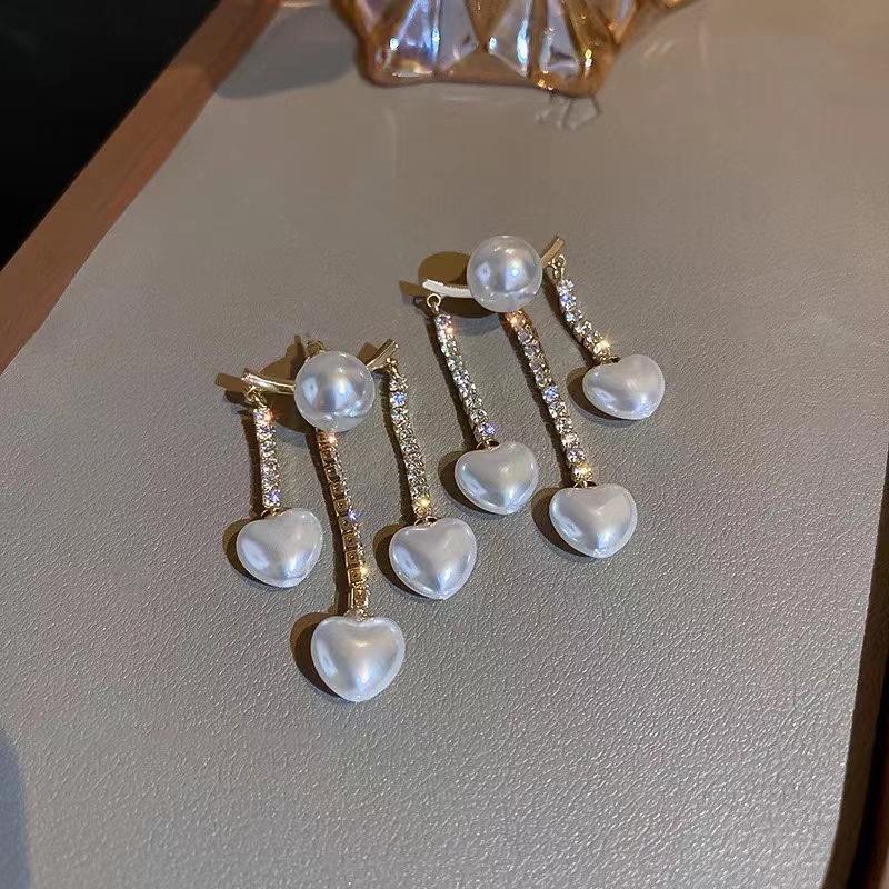 Серьги-подвески в форме сердца из серебра 925 пробы — модные, универсальные и в корейском стиле с акцентами из стразов