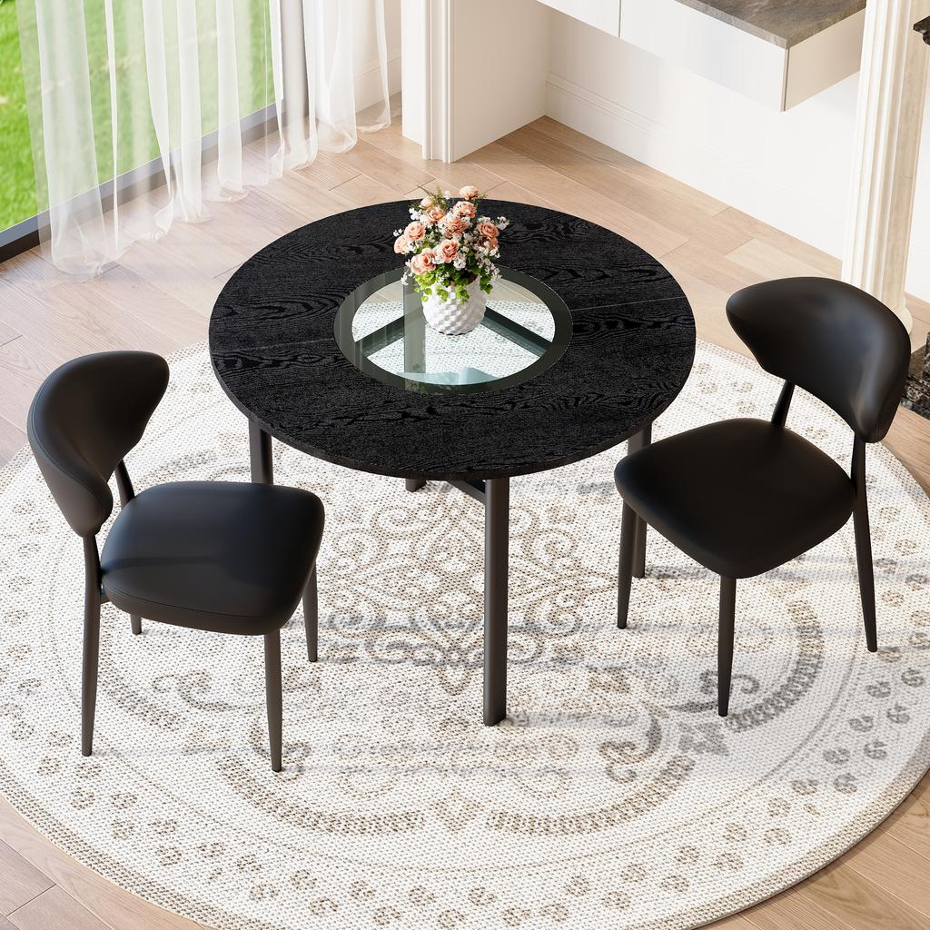 Minimalist round table set (with 2 black armchairs made of PU material and curved comfort backrest), with 100 cm diameter in black wood look.