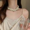 Chic Retro Multi-Layer Pearl Clavicle Necklace: European & American Style for Women - Light Luxury Fashion Accessory