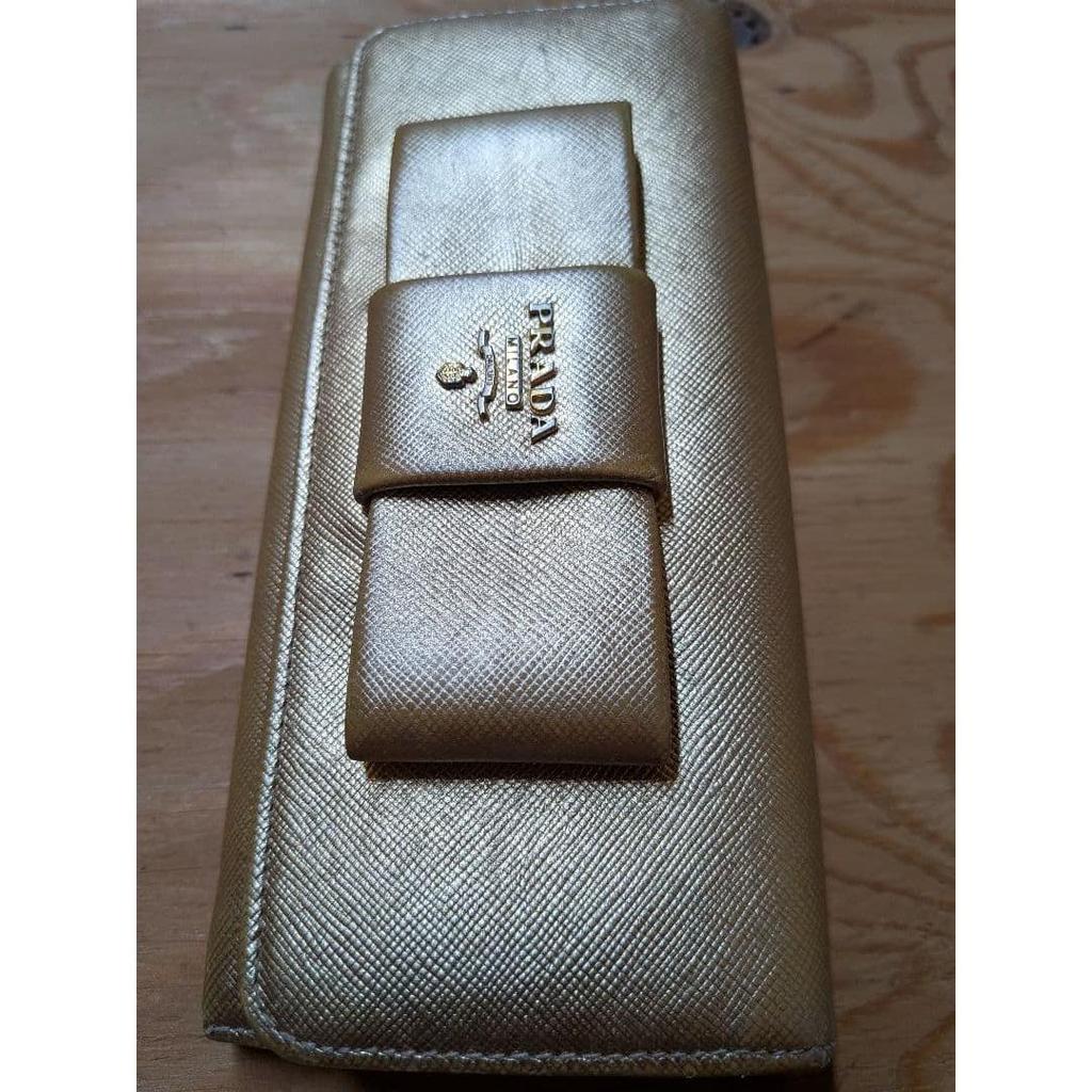 Used PRADA Bi-fold wallet with gold ribbon
