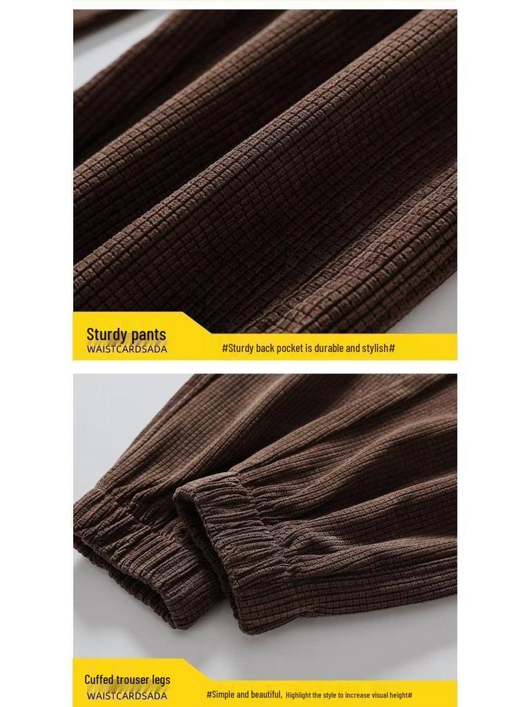 Men's Black Corduroy Plus Velvet Thickened Tapered Casual Pants for Autumn and Winter.