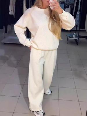 Трендовый женский повседневный костюм-двойка 2024: Круглый вырез, длинный рукав, горячая отделка стразами, манжеты на кулиске. Подходит для осени и зимы.