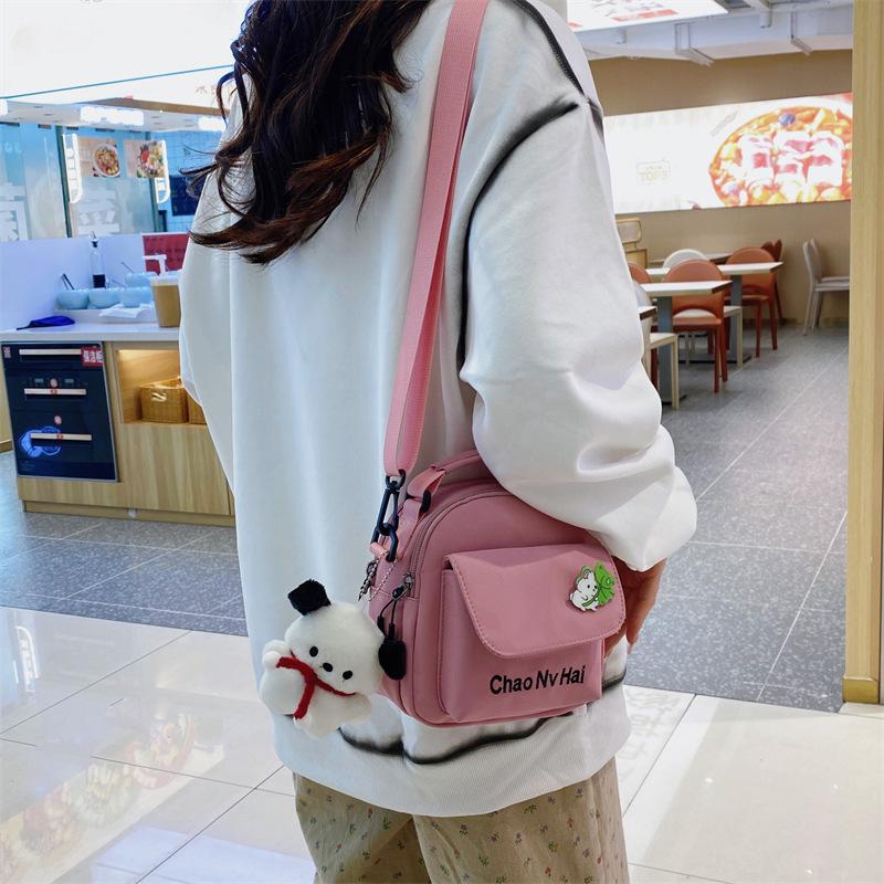 Cute Japanese canvas bag 2025 early autumn new small fresh messenger bag women's Korean version fashion simple messenger bag