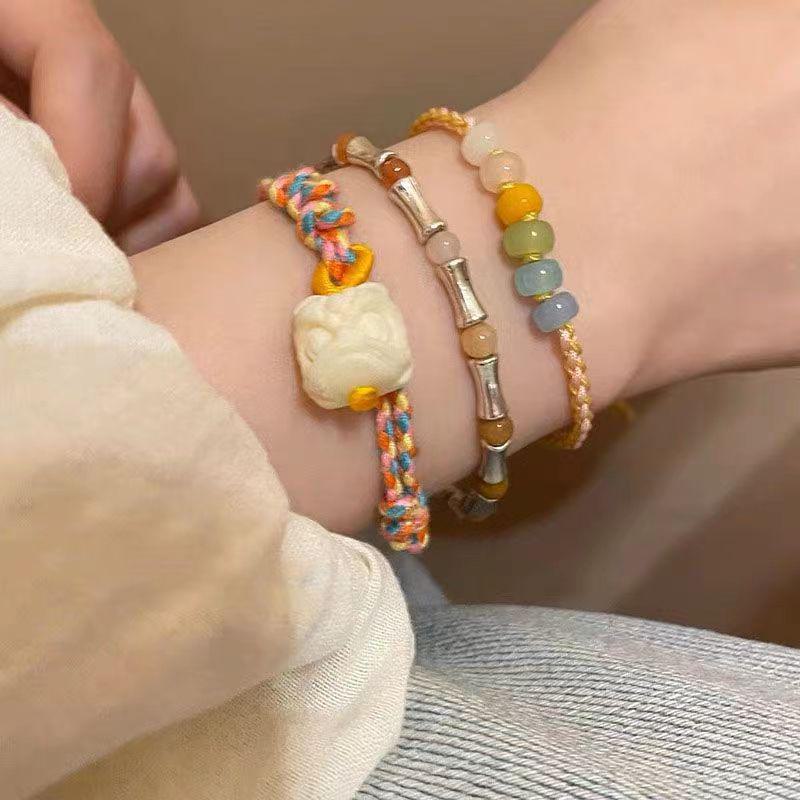 Elegant Bamboo Braided Lion Dance Bracelet - Niche Design, High-End Beaded Jewelry for Women and Students