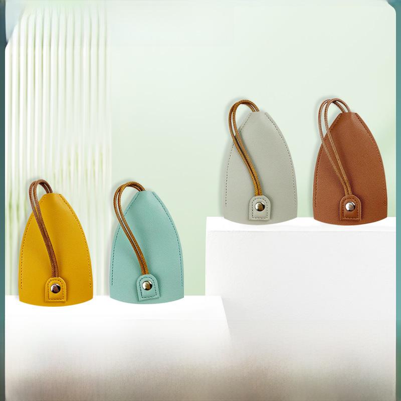 "Compact PU Leather Key Storage Pouch with Pull-Out Feature"