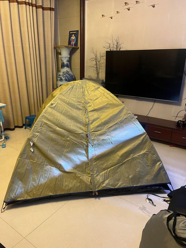 Portable Double-Layer Camping Tent with Sun and Mosquito Protection, Lightweight and Ventilated for Outdoor Adventures
