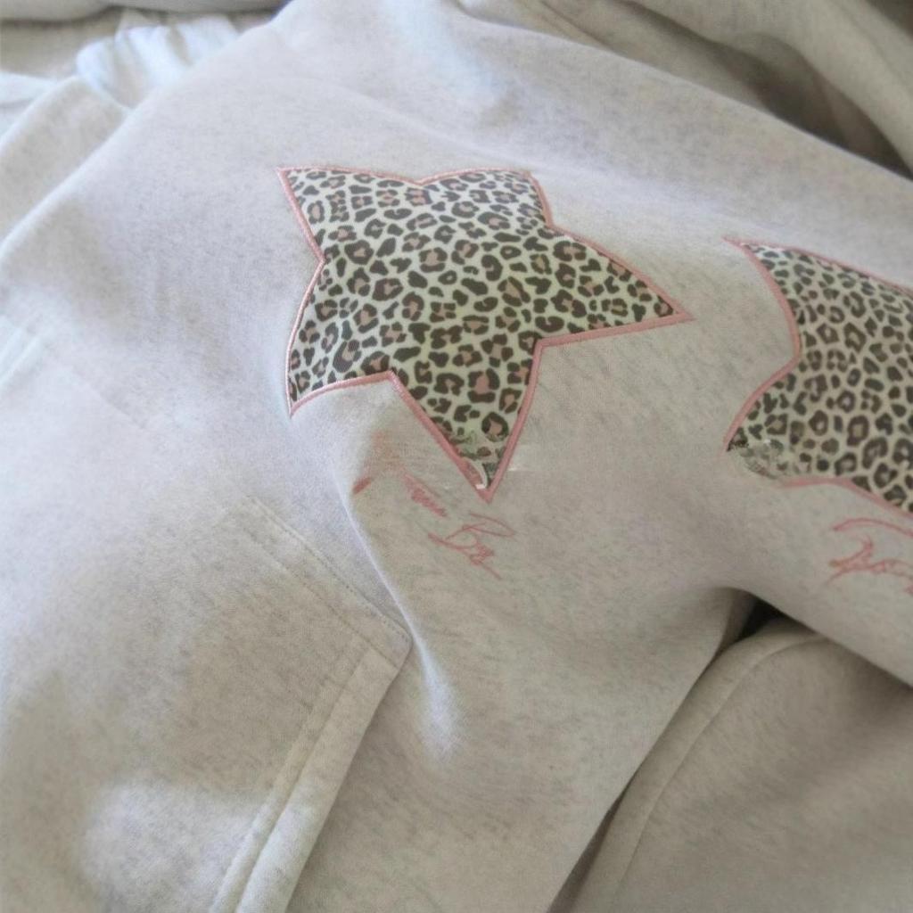 Suéter con capucha de punto informal holgado de primavera con estampado de leopardo y estrellas bordadas, versátil, para hombre y mujer