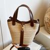 Korean Version of Casual Solid Color Temperament Simple Portable Bucket Bag for Women Versatile Commuter Knitted Crossbody Fashion Straw Bag