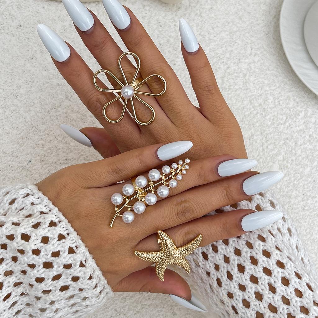 Модные многослойные изделия из нерегулярного сплава с ветровым покрытием, инкрустированные жемчугом, набор колец Dendritic, простая тенденция, высокое чувство женских украшений