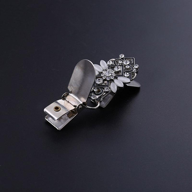 Застежка в виде клипов для кардигана