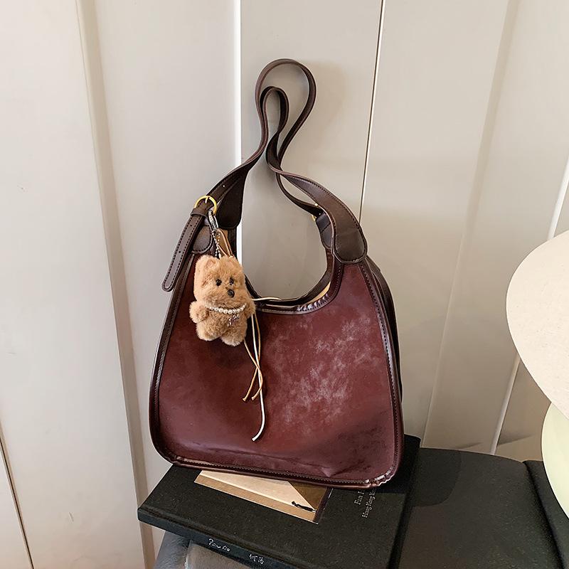 Изысканная Универсальная Кожаная Сумка на Одно Плечо Портативная Большая Вместимость Модная Темпераментная Иностранная Премиальная 2025 Осенняя Женская Сумка-Тоут