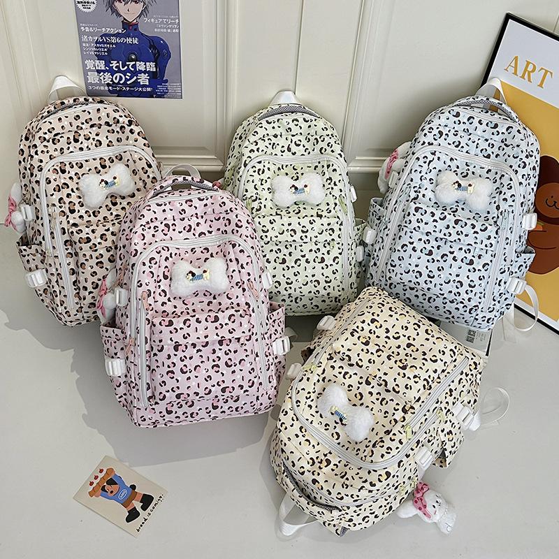 Schoolbag school bag niche girls junior high school students multi-color leopard print 1011 new backpack high value light large capacity backpack