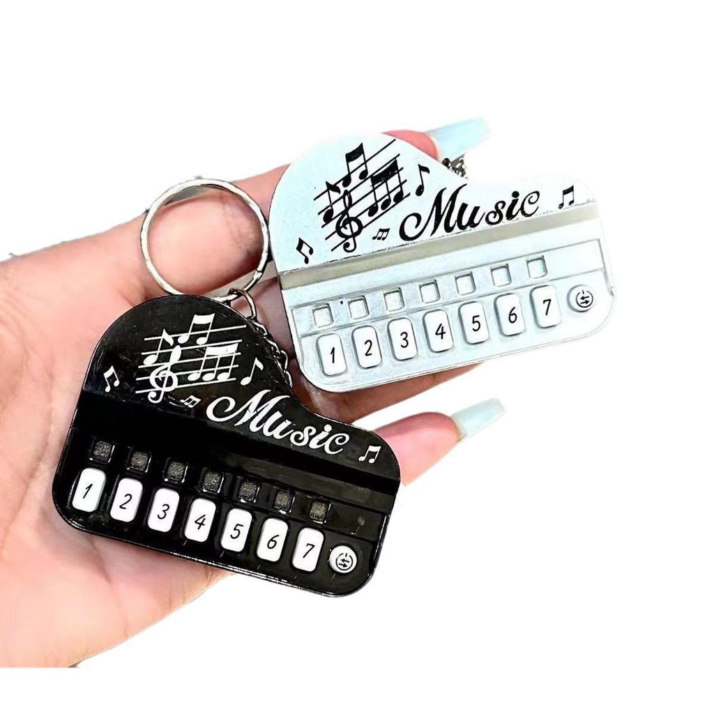 Эксклюзивный купон для новичков: Креативный светящийся брелок-игрушка «Мастер фортепиано»