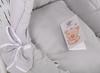White wicker pushchair for dolls with gray bedding and soft lining
