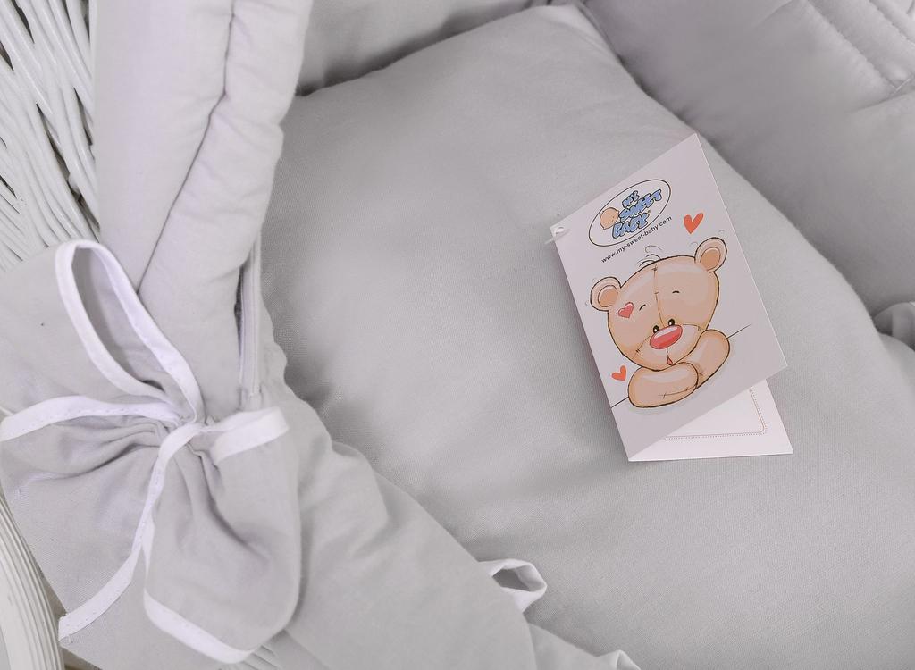 White wicker pushchair for dolls with gray bedding and soft lining