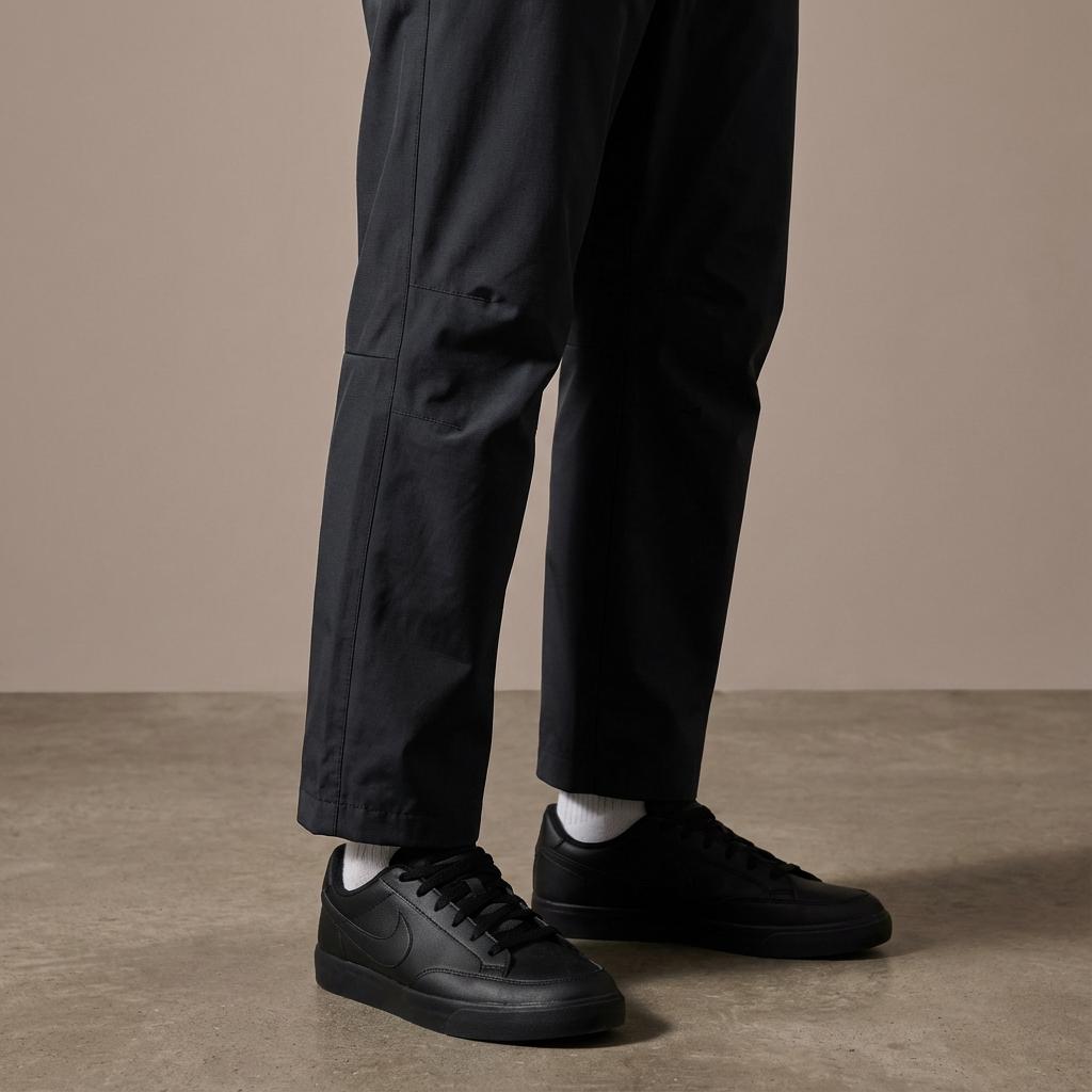 Nike Технологичные тканые брюки свободного кроя с прямыми штанинами, модные, универсальные, водонепроницаемые, повседневные, мужские, черные FZ0711060