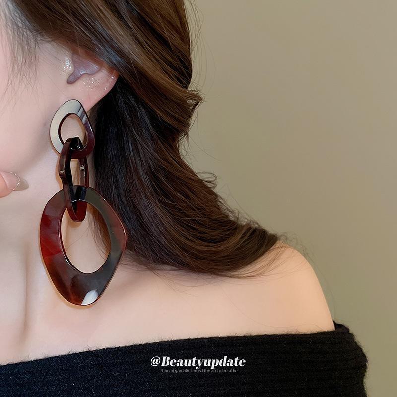 Серебряные серьги-цепочки с иглами из смолы и нестандартной формы — смелый европейский и американский модный дизайн.