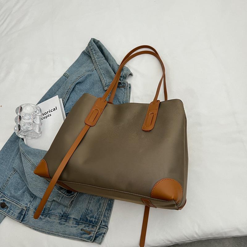 Женская сумка-тоут большой вместимости весна 2024 г.: Простая сумка через плечо и для поездок на работу в стиле нишевой моды