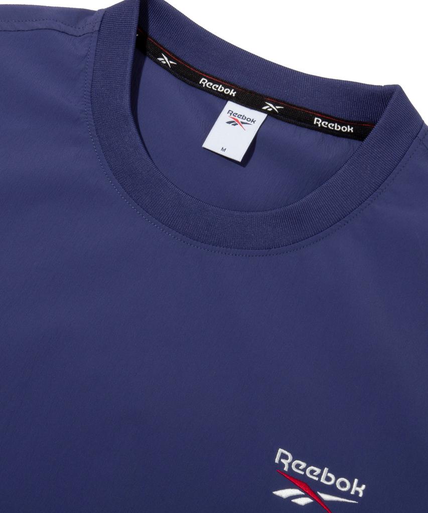 Reebok Ледяная плетеная футболка с коротким рукавом Piste - Темно-синий