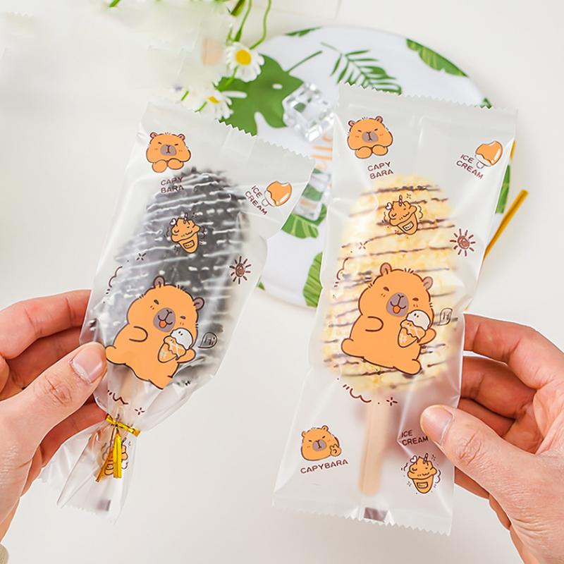 100 шт. Милые мультяшные пищевые пакеты для мороженого Одноразовые пластиковые защитные чехлы для эскимо Пакет для хранения и упаковки Сделай сам