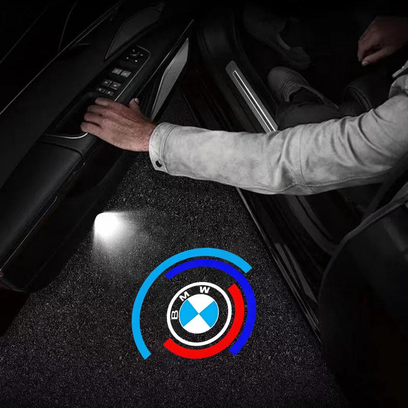 BBIU7 2Pcs Led HD Car Door Welcome Light Projector Lamps For BMW 50th Anniversary 1 3 5 7 series E83 F16 E70 Car Styling Accessories