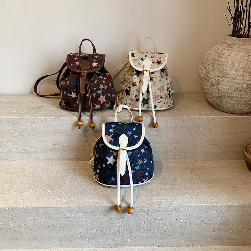 Сумка 2025 новая корейская версия модный принт повседневный для поездок на работу маленький школьный рюкзак женский в зарубежном стиле универсальный дорожный рюкзак