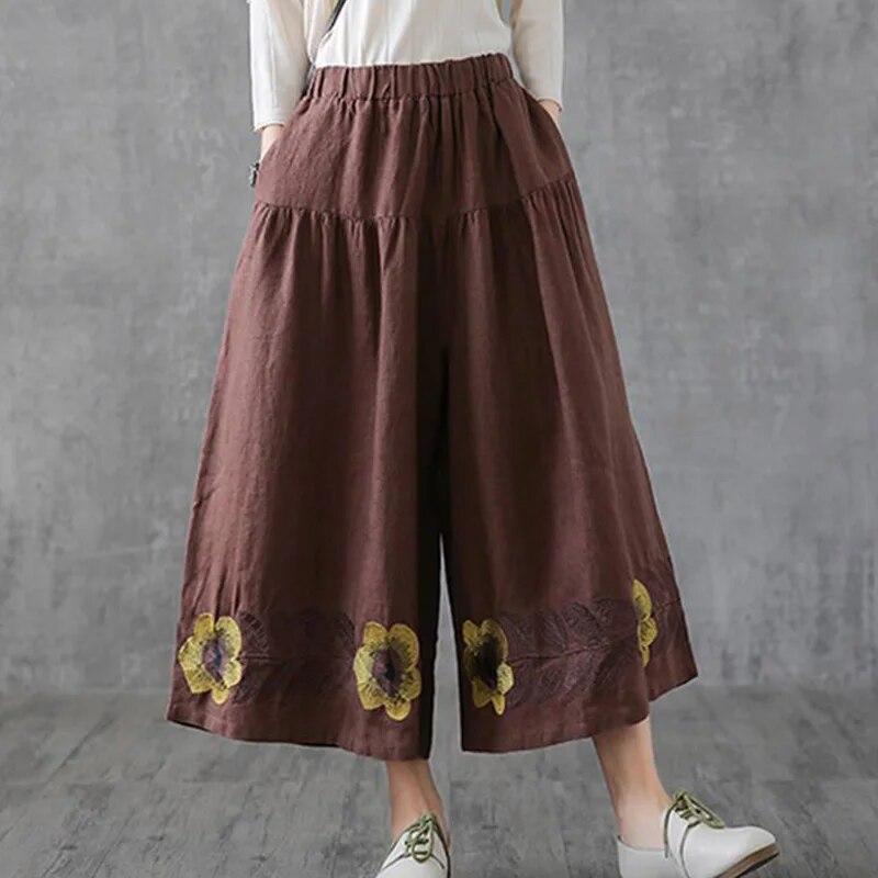 Летние винтажные широкие брюки с вышивкой в ​​семь точек, хлопковые и льняные повседневные брюки с эластичной резинкой на талии и карманами в стиле пэчворк.