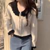 Autumn and Winter New French Retro Doll Neck Knitted Sweater for Women Gentle Style Loose Short Sweater Trend