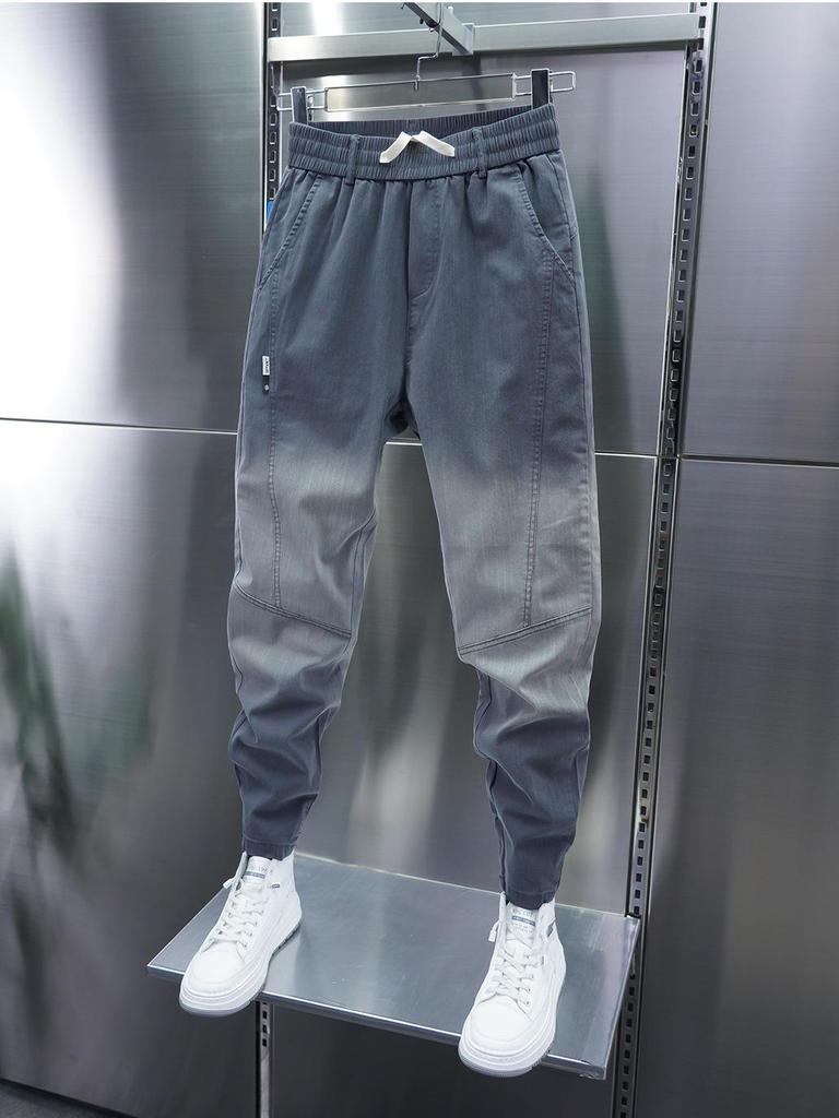 Мужские облегающие джинсы с градиентной строчкой и эластичными манжетами