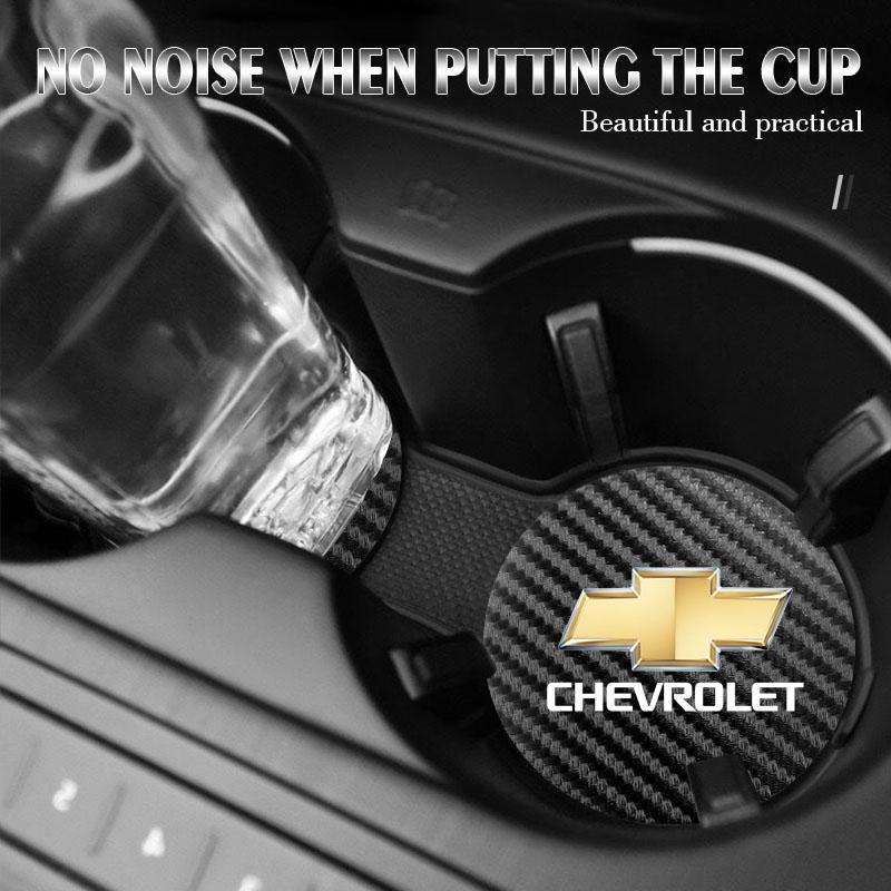 EII3   2Pcs Car Carbon Leather Water Cup Pad Anti Noise Coaster Mat For Chevrolet Silverado Camaro Tahoe Equinox Suburban Cruze Malibu