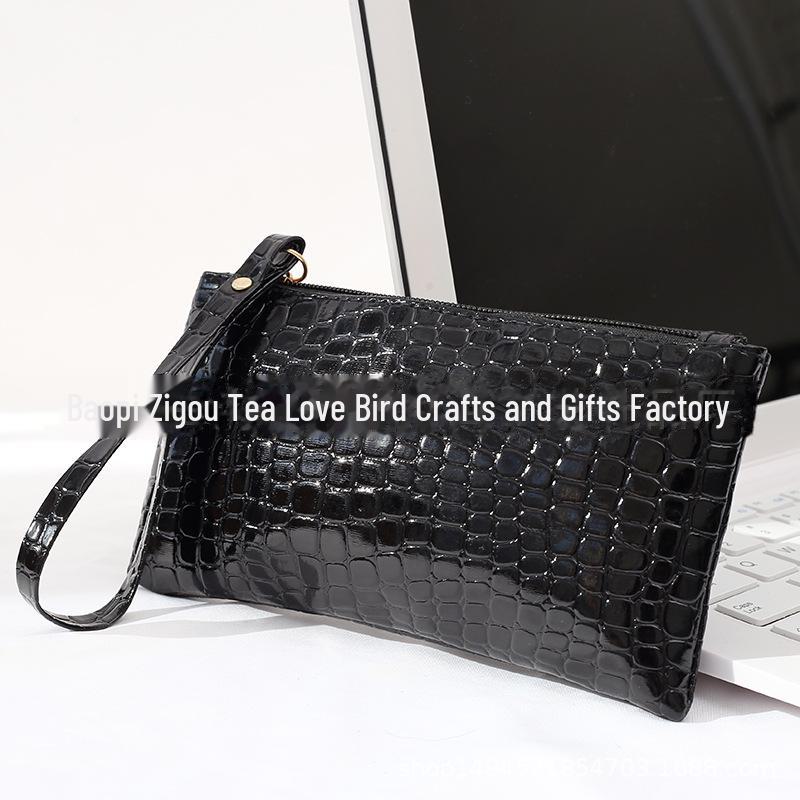 Черный клатч-кошелек унисекс с крокодиловым узором – модный и компактный