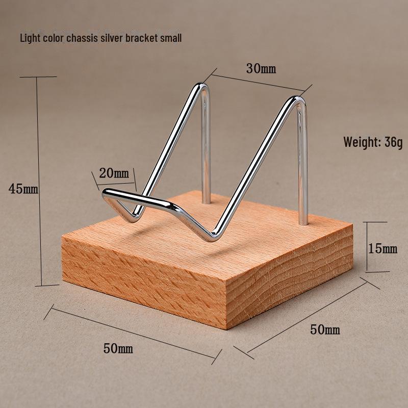 "Heart-Shaped Crystal Mineral Specimen On Iron Stand with Wooden Jewelry Display"